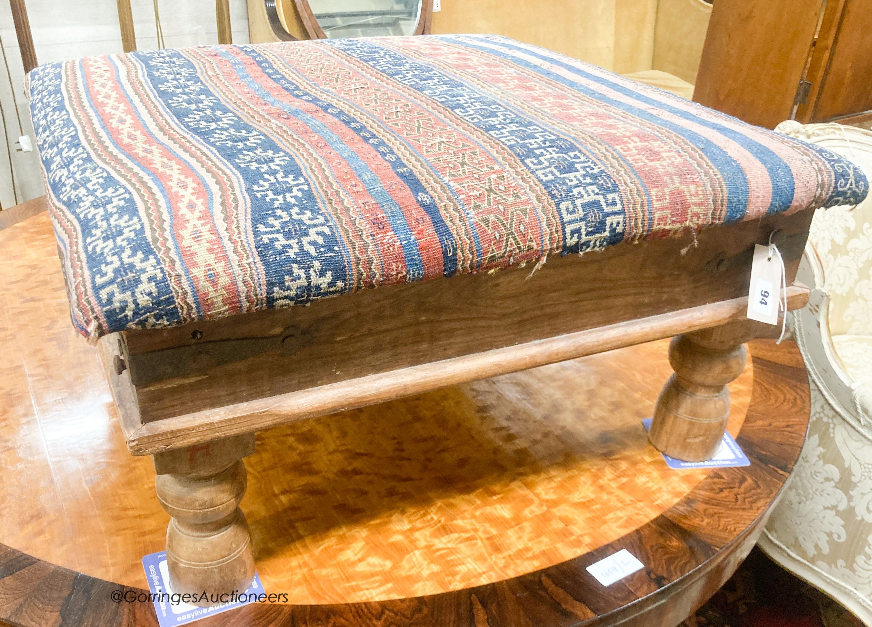 A square hardwood Kelim foostool, length 69cm, depth 69cm, height 34cm